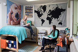 two students in west hall residence hall room